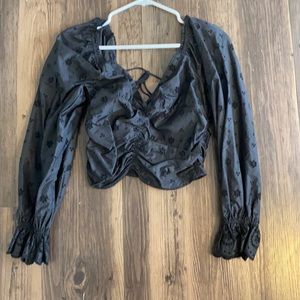 Black off the shoulder floral top.